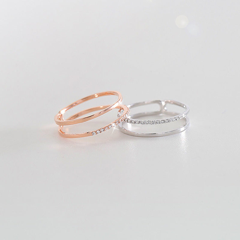 Damenring mit offenen Details und funkelnden Zirkonia Shop Nory