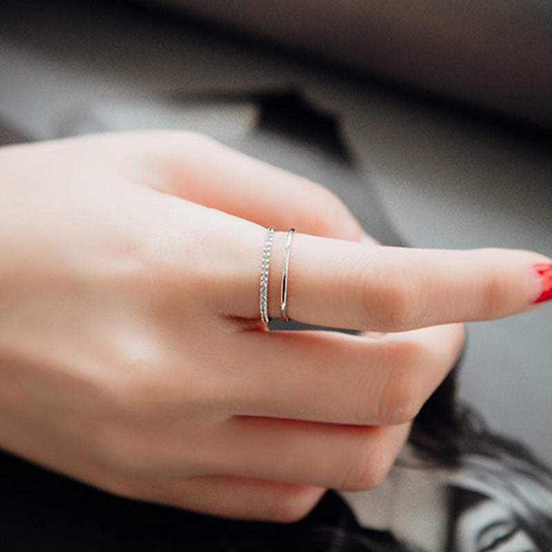 Damenring mit offenen Details und funkelnden Zirkonia Shop Nory
