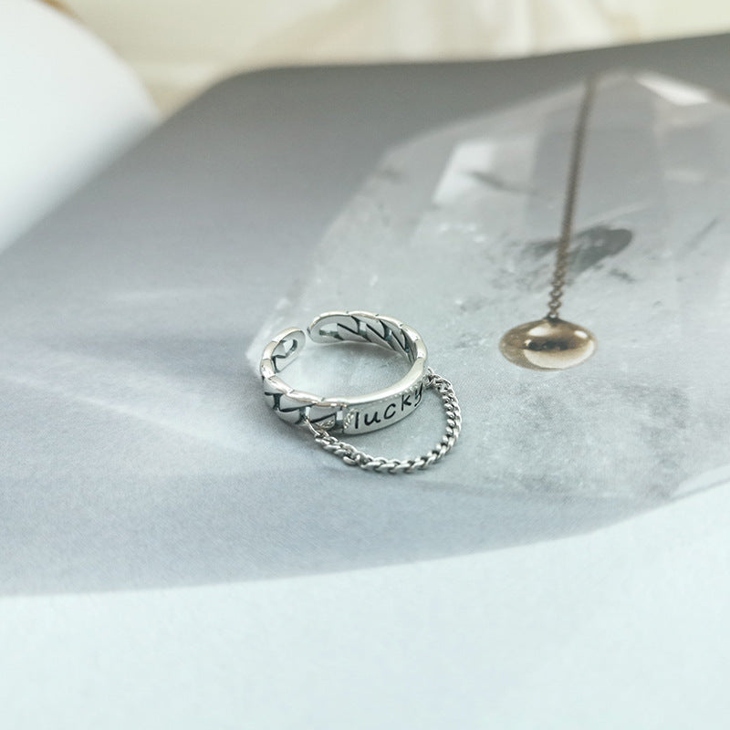 Damenring mit charmantem Schriftzug und modischem Kettendesign Shop Nory