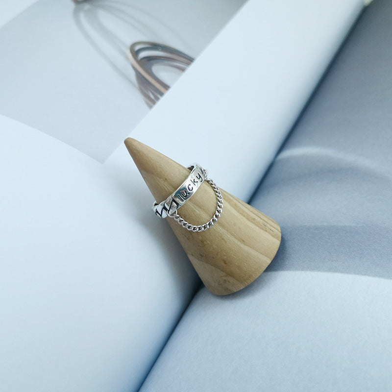 Damenring mit charmantem Schriftzug und modischem Kettendesign Shop Nory
