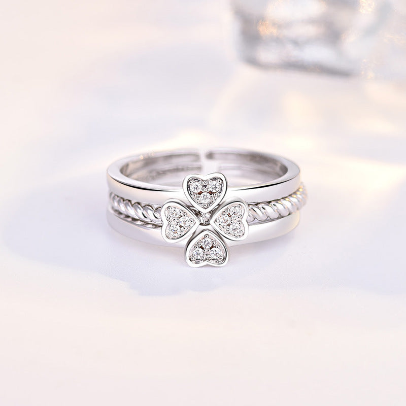 Damen Offener Ring mit kunstvollem geschwungenem Design und roségoldenen Akzenten Shop Nory