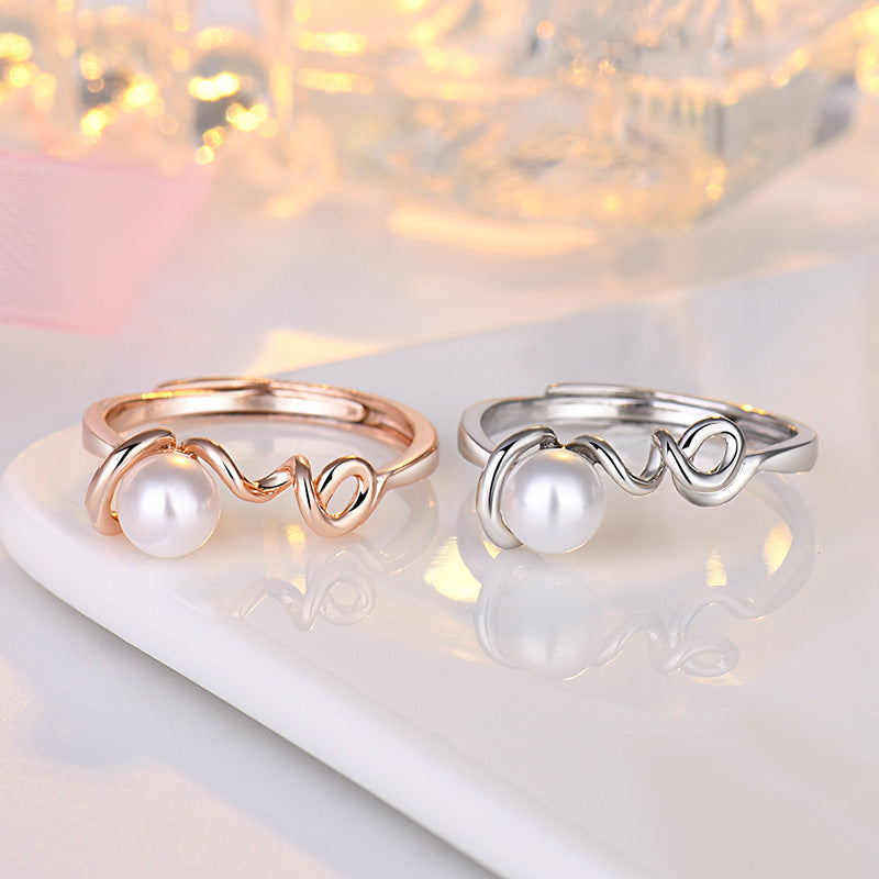 Damenring mit kunstvollem Wellen-Design und einer hochwertigen Perle Shop Nory