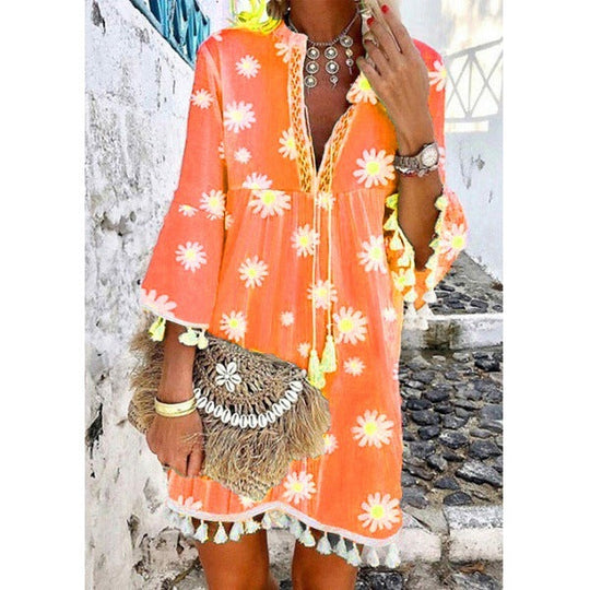 Damen Strandkleid mit floralen Motiven und Quastenverzierungen