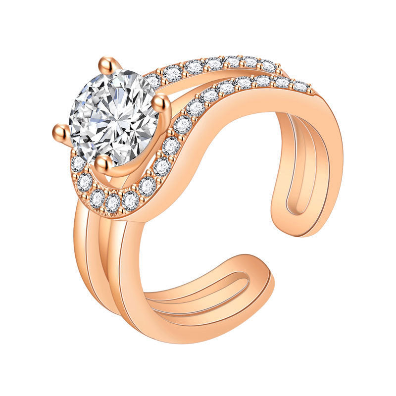 Damen Offener Ring mit kunstvollem geschwungenem Design und roségoldenen Akzenten Shop Nory