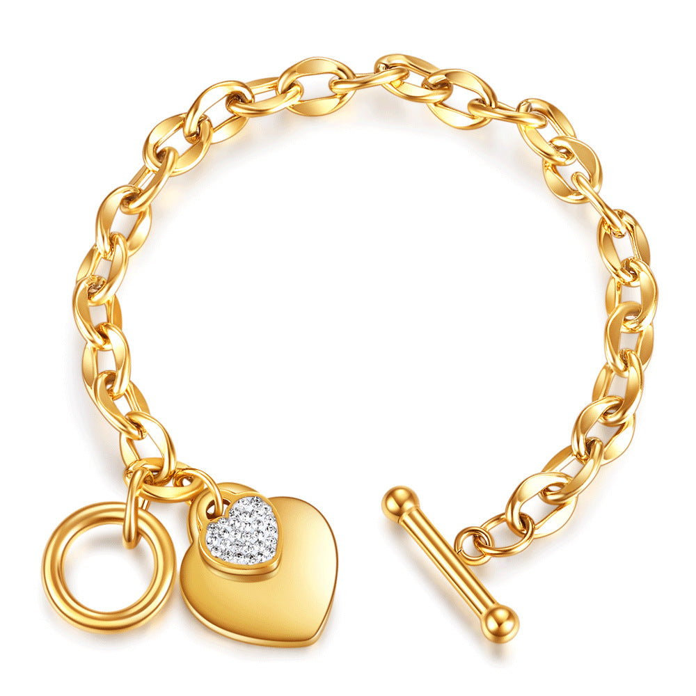 Damen Armband mit herzförmigem Anhänger und funkelnden Zirkonia Shop Nory