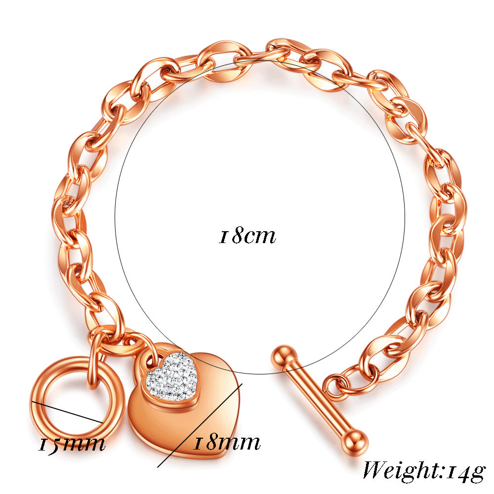 Damen Armband mit herzförmigem Anhänger und funkelnden Zirkonia Shop Nory