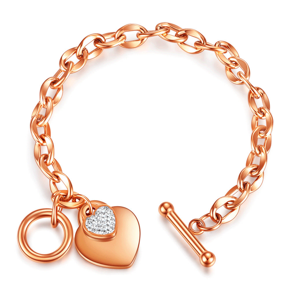 Damen Armband mit herzförmigem Anhänger und funkelnden Zirkonia Shop Nory