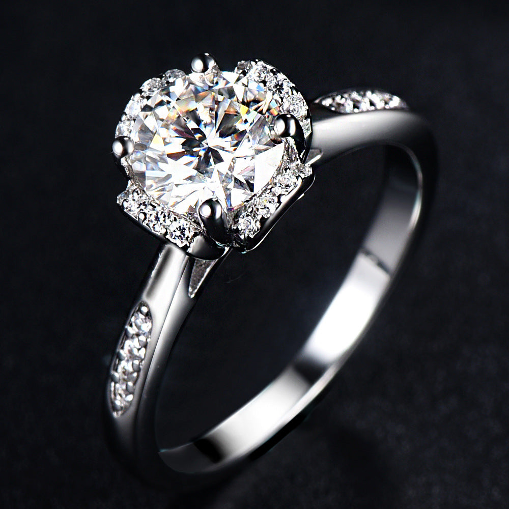 Damen Ring mit funkelndem Solitär und kunstvollem Zirkonia-Besatz Shop Nory