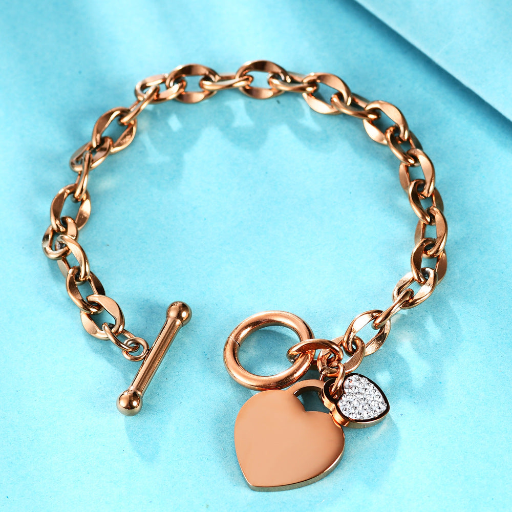Damen Armband mit herzförmigem Anhänger und funkelnden Zirkonia Shop Nory