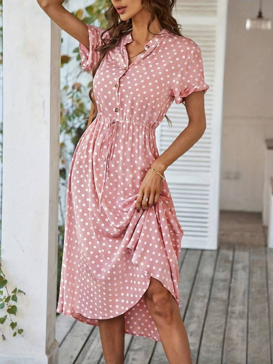 A-linien-kleid mit polka-dot-print und v-ausschnitt