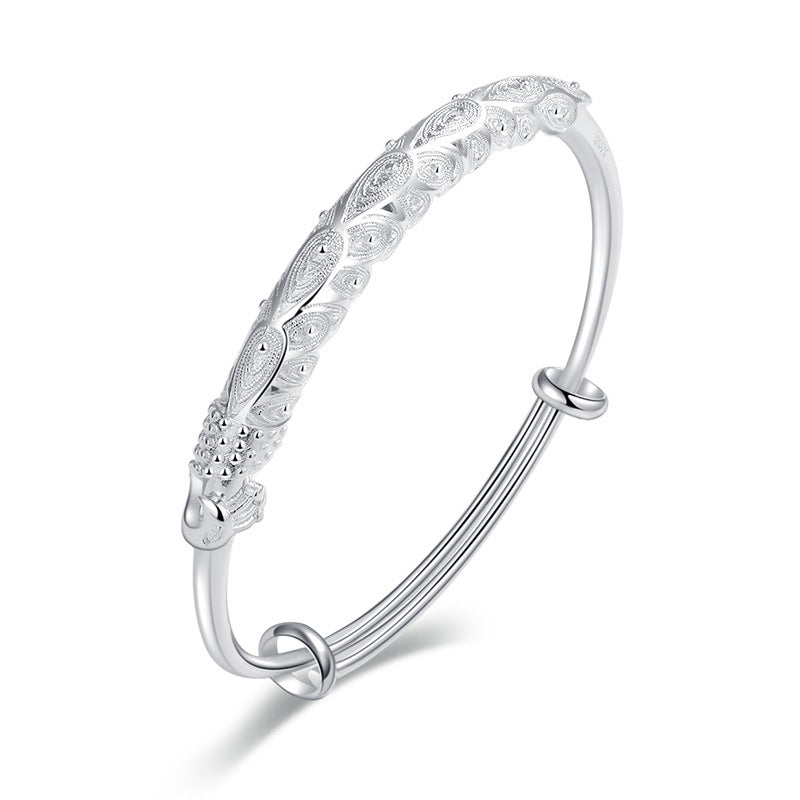 Damen Elegantes Armreif mit kunstvollem Federmotiv Shop Nory