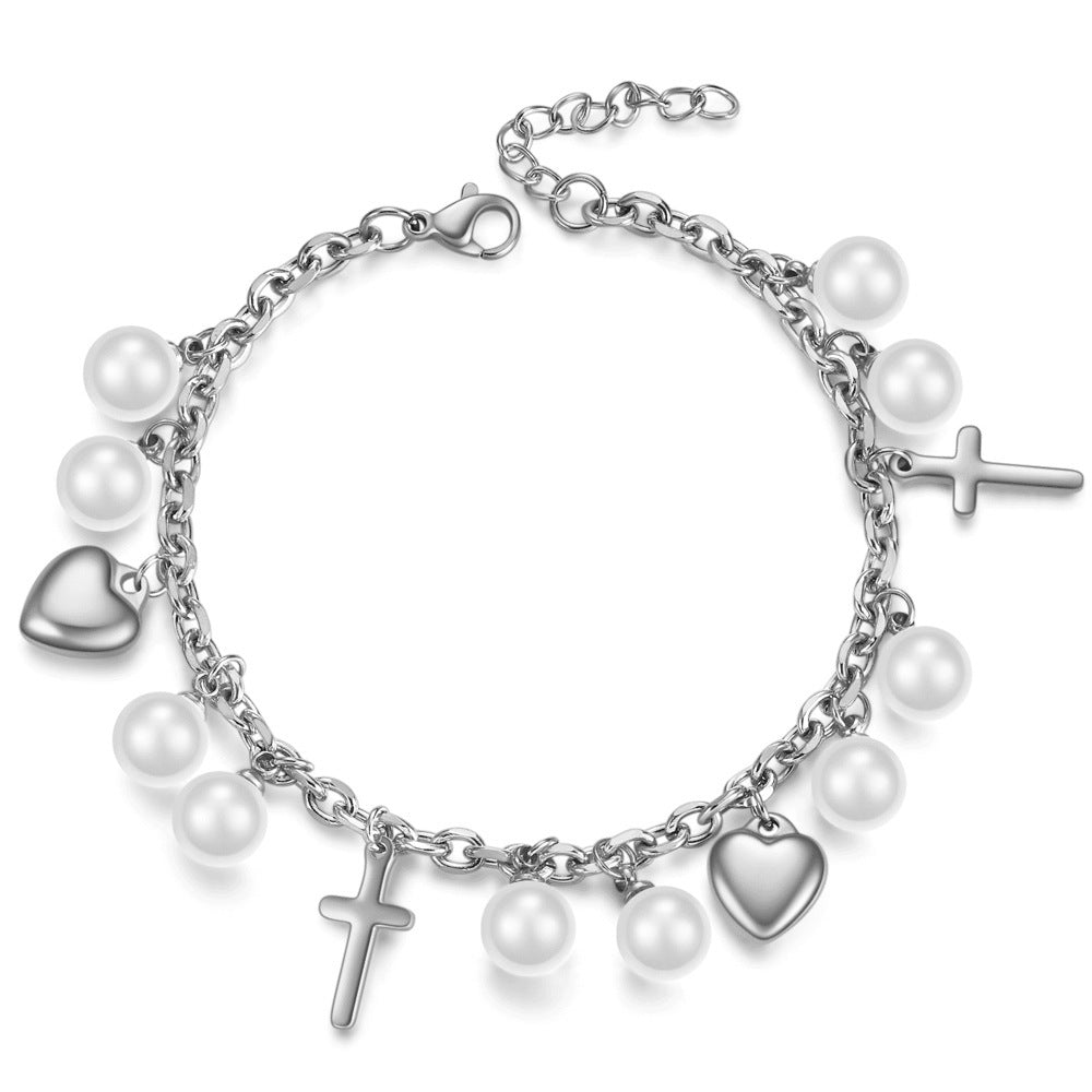 Damen Armband mit perlenbesetzten Herzen und Kreuzanhängern Shop Nory