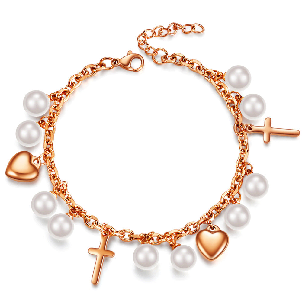 Damen Armband mit perlenbesetzten Herzen und Kreuzanhängern Shop Nory