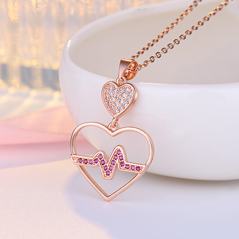 Damen Halskette mit Herzanhänger im EKG-Design und funkelnden Zirkonia Shop Nory