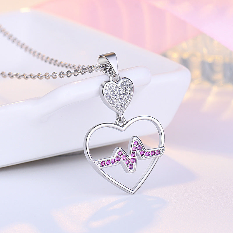 Damen Halskette mit Herzanhänger im EKG-Design und funkelnden Zirkonia Shop Nory