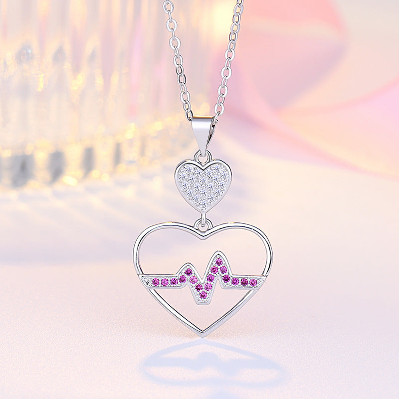 Damen Halskette mit Herzanhänger im EKG-Design und funkelnden Zirkonia Shop Nory