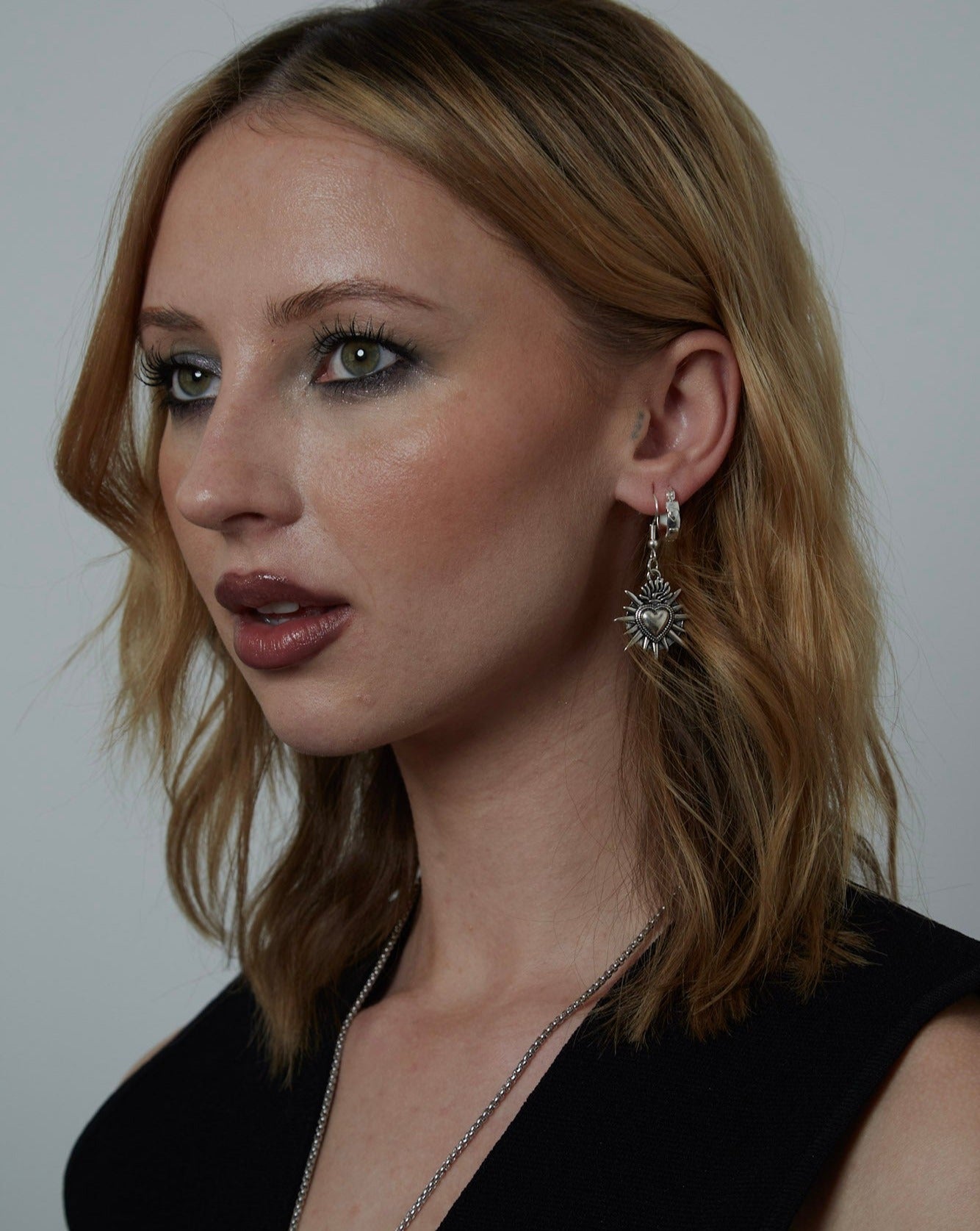 Silver Sacred Flaming Heart Charm Earrings | Shop Nory