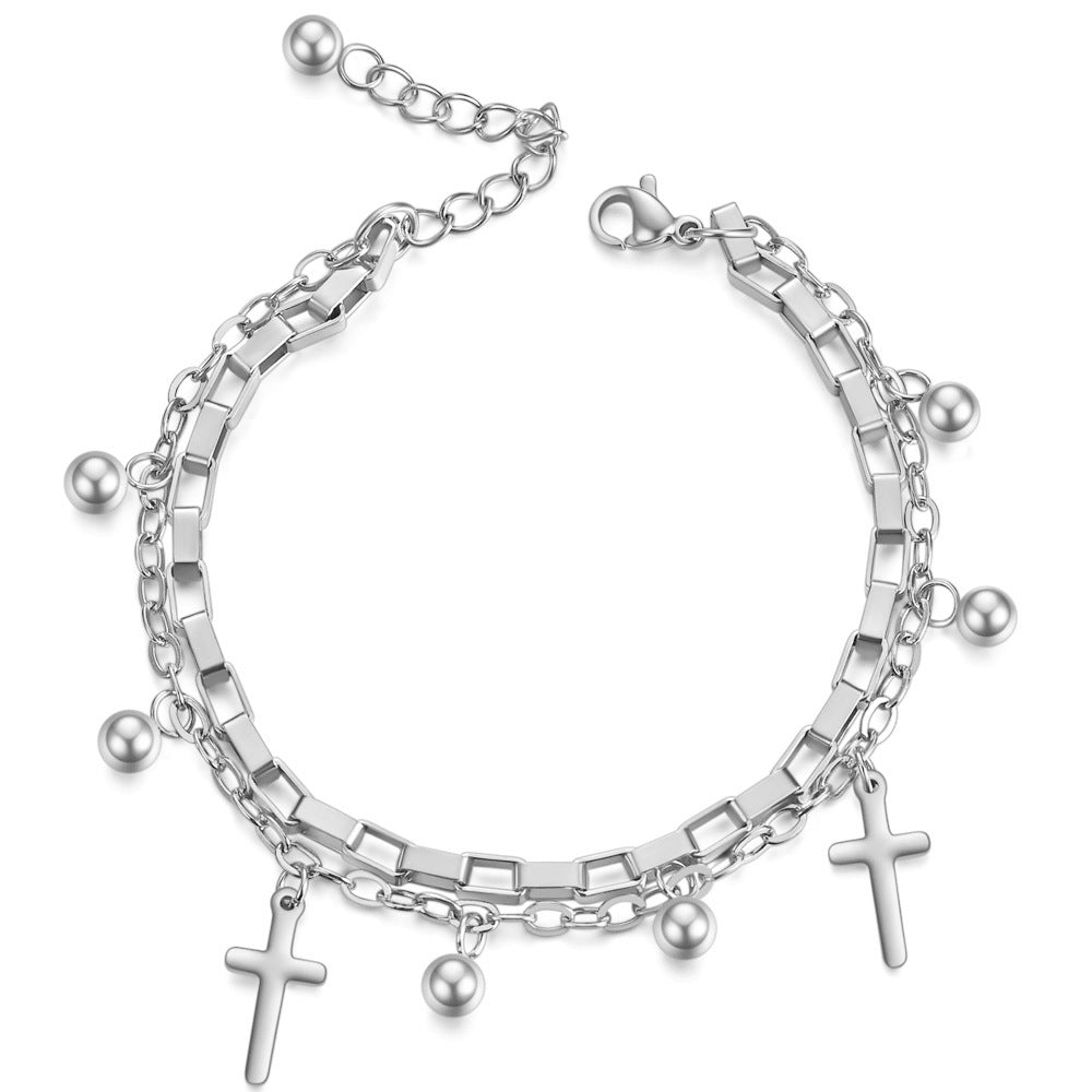 Damen Armband mit eleganter Kettenstruktur und trendigem Kreuzanhänger Shop Nory