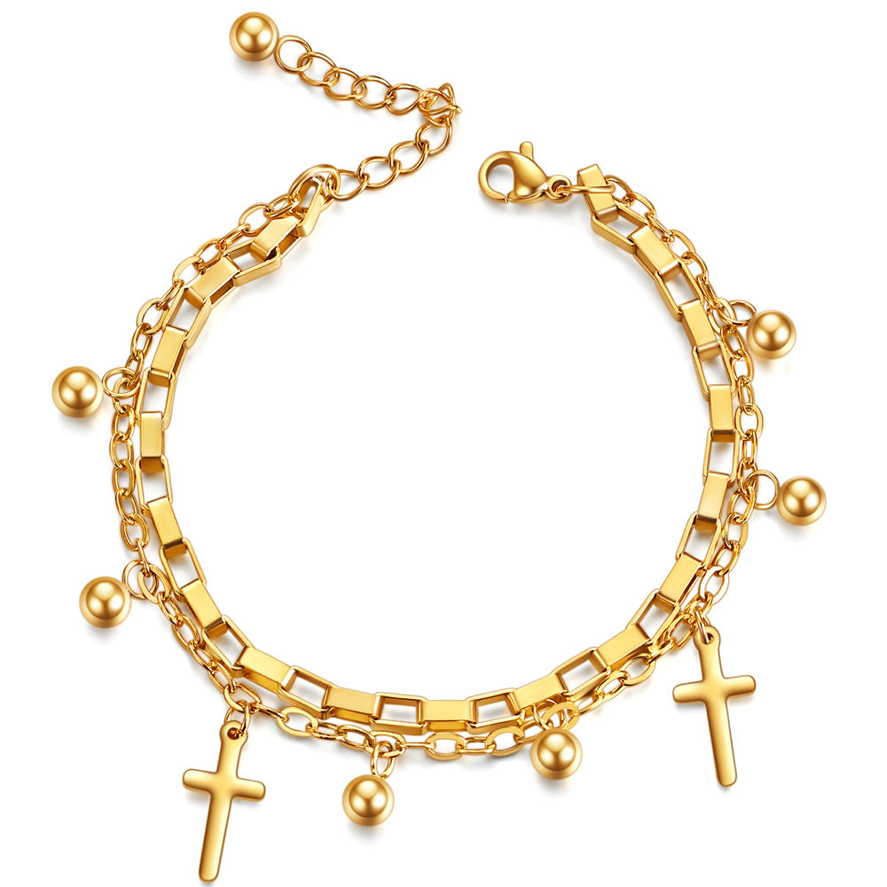 Damen Armband mit eleganter Kettenstruktur und trendigem Kreuzanhänger Shop Nory