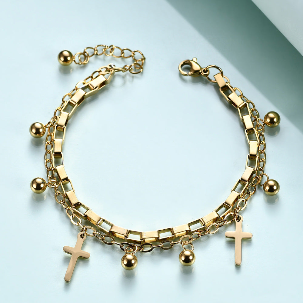 Damen Armband mit eleganter Kettenstruktur und trendigem Kreuzanhänger Shop Nory