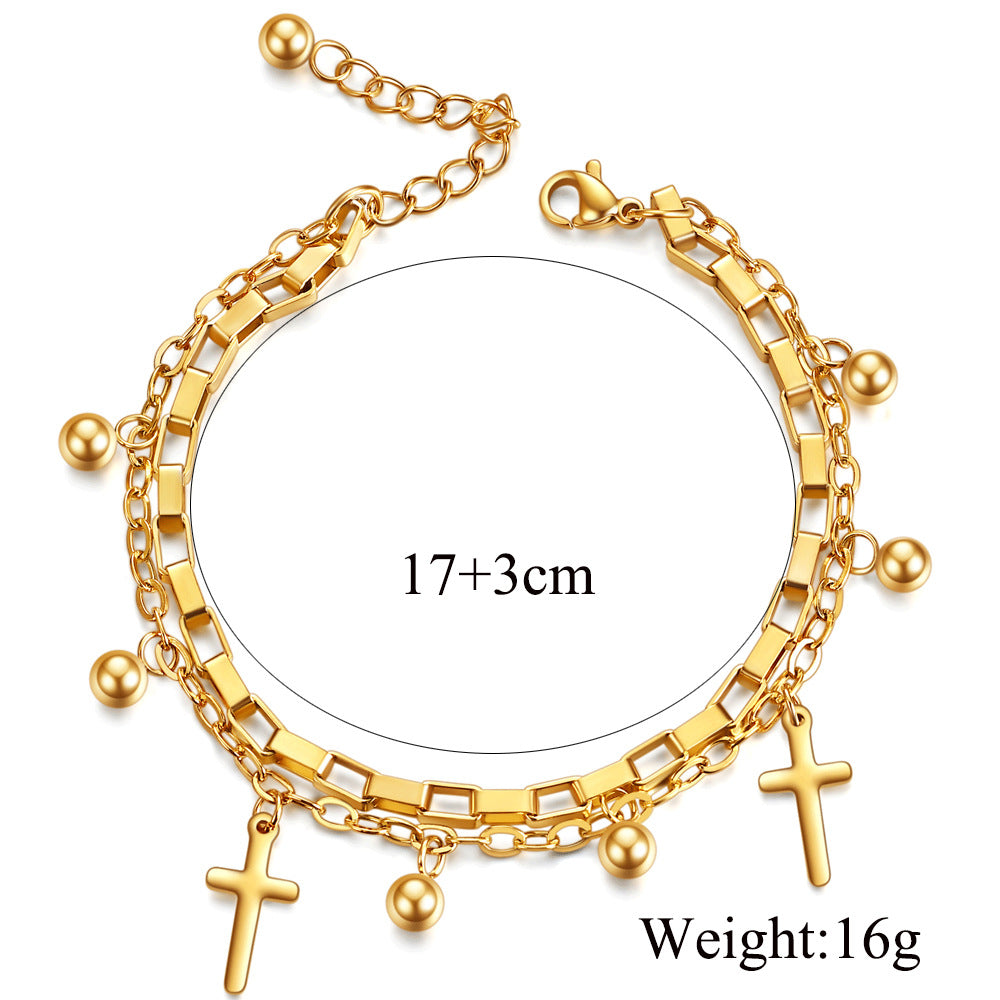 Damen Armband mit eleganter Kettenstruktur und trendigem Kreuzanhänger Shop Nory