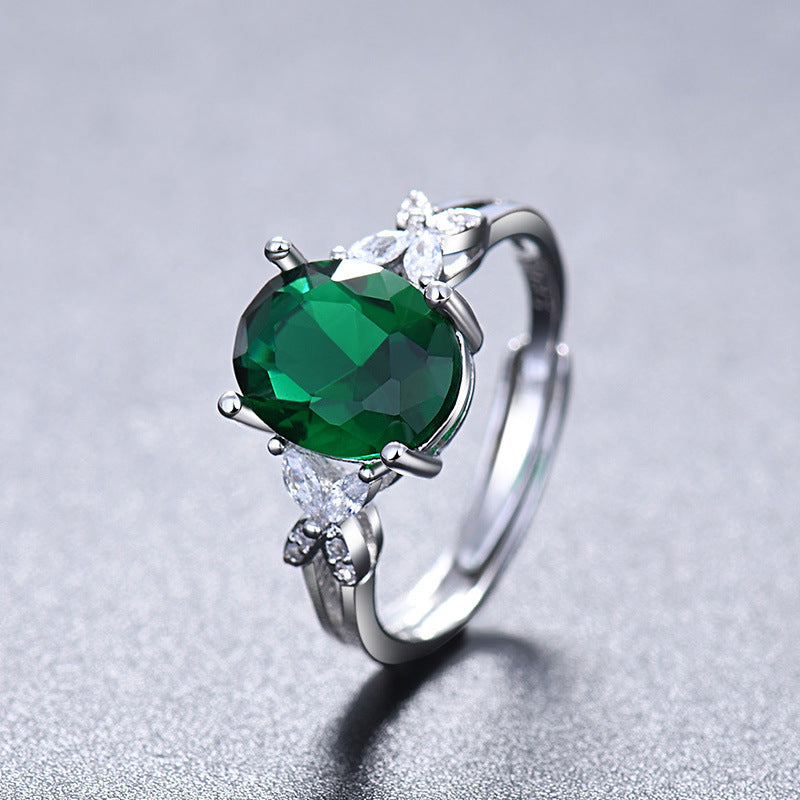 Damen eleganter Ring mit floralem Design und funkelndem Hauptstein Shop Nory