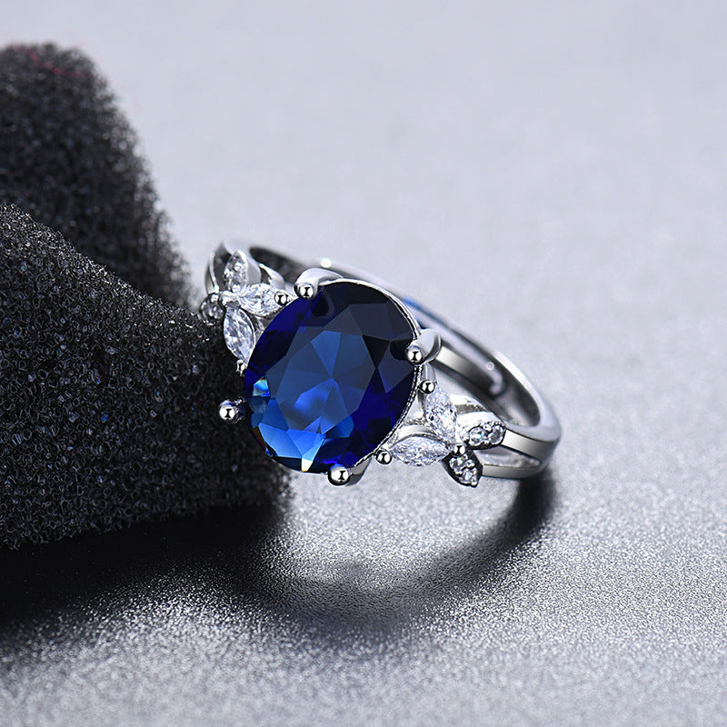 Damen eleganter Ring mit floralem Design und funkelndem Hauptstein Shop Nory
