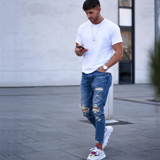 Herren modische Slim Fit Jeans mit angesagten Rissen und Verjüngung