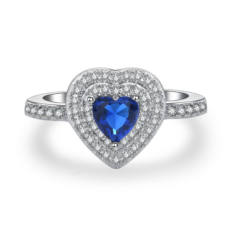 Damen Ring mit herzförmigem Rubin und funkelndem Zirkonia-Besatz Shop Nory