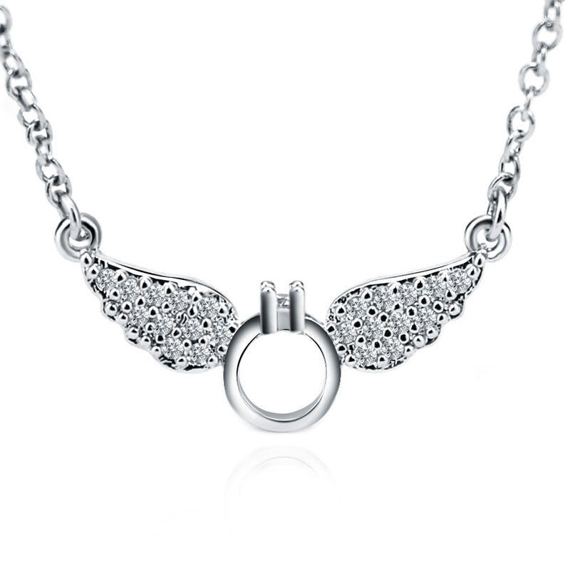 Damen Halskette mit filigranem Flügelanhänger und funkelnden Zirkonia Shop Nory
