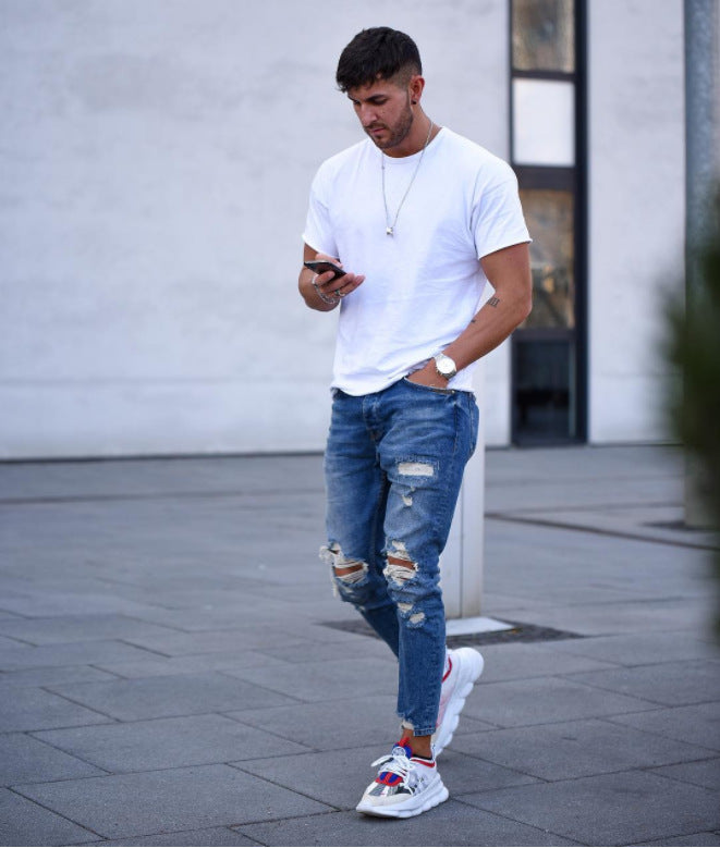 Herren modische Slim Fit Jeans mit angesagten Rissen und Verjüngung