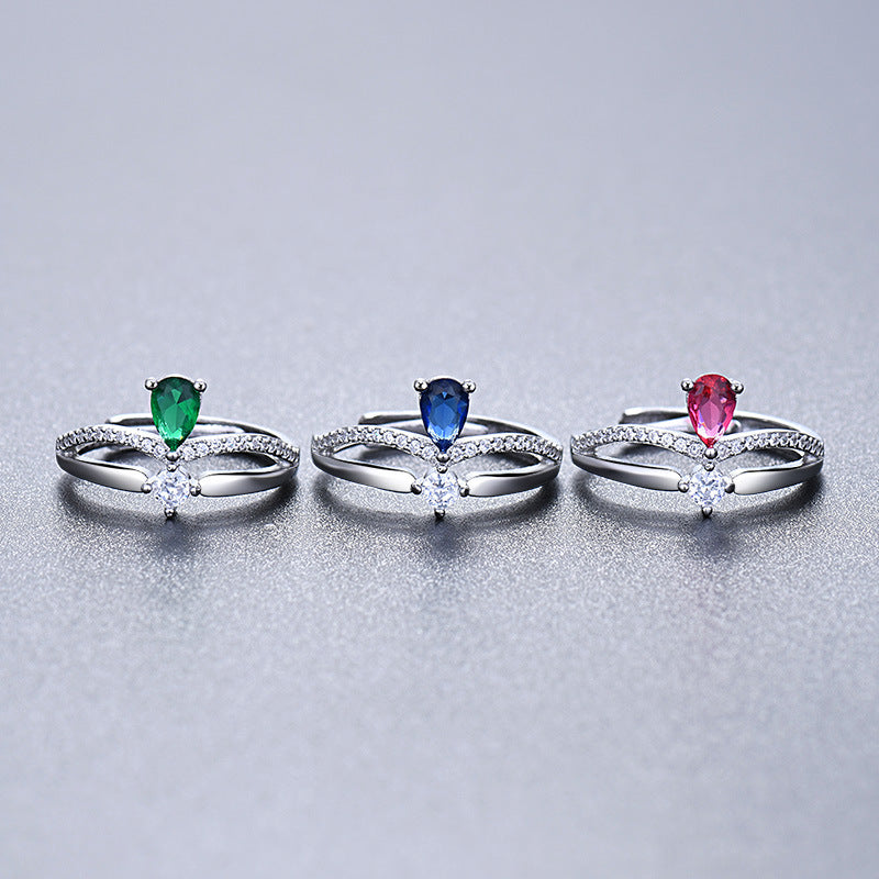 Damenring mit elegantem, tropfenförmigem Edelsteinbesatz und Zirkonia-Details Shop Nory