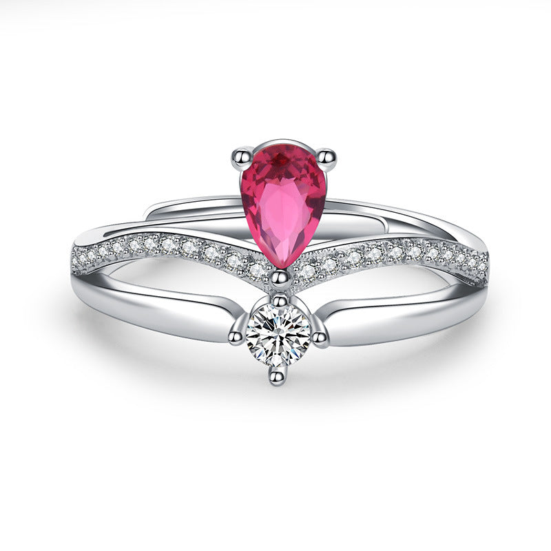Damenring mit elegantem, tropfenförmigem Edelsteinbesatz und Zirkonia-Details Shop Nory