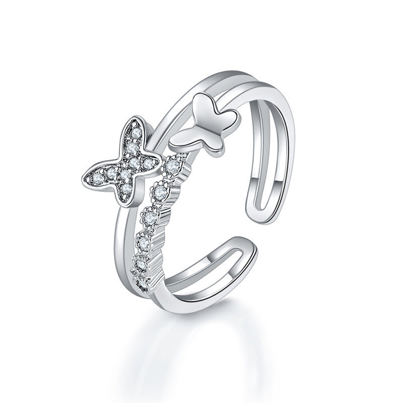 Damen Offener Ring mit kunstvollem Schmetterlingsdesign und funkelnden Zirkonia Shop Nory