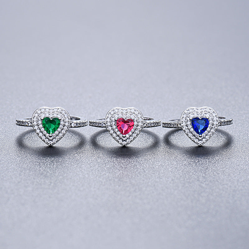 Damen Ring mit herzförmigem Rubin und funkelndem Zirkonia-Besatz Shop Nory