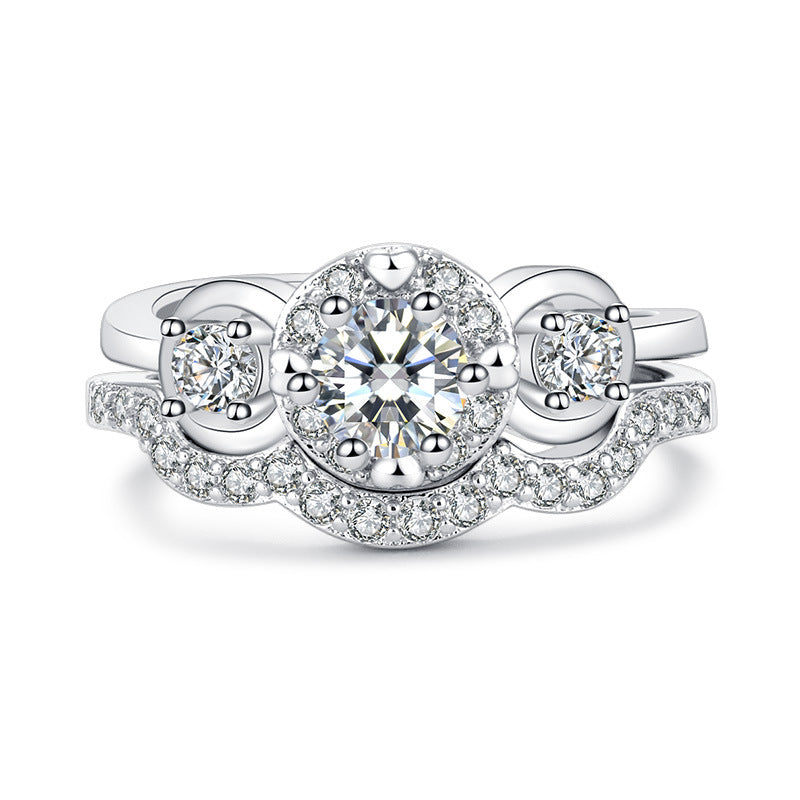 Damen Verlobungsring mit kunstvollem Zirkonia-Besatz und eleganter Wellenstruktur Shop Nory