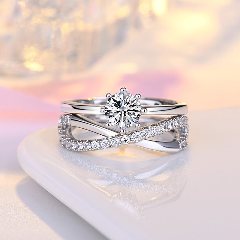 Damen-Verlobungsring mit kunstvollem Zirkonia-Besatz und eleganter Drahtarbeit Shop Nory