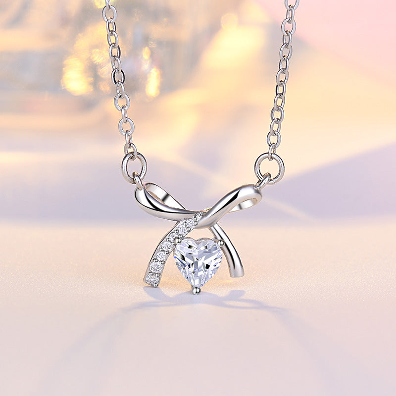 Damen Halskette mit herzförmigem Anhänger und funkelndem Zierband Shop Nory