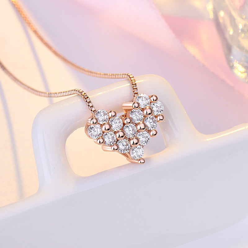 Damen Halskette mit Herz-Charm aus funkelnden Zirkonia-Steinen Shop Nory