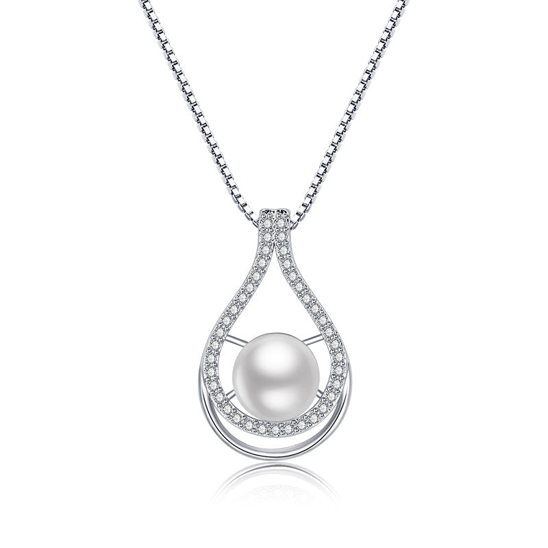 Damen Halskette mit elegantem Tropfen-Anhänger aus feinem Metall und funkelnden Kristallen Shop Nory