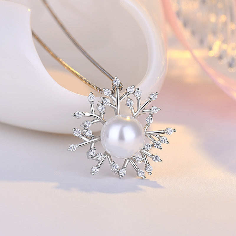 Damen Halskette mit elegantem Schneeflockenanhänger und luxuriöser Perle Shop Nory