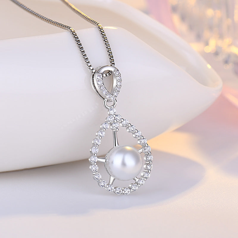 Damen Halskette mit luxuriösem Perlenanhänger und funkelnden Zirkonia-Elementen Shop Nory