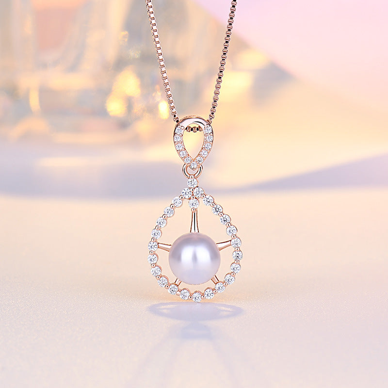 Damen Halskette mit luxuriösem Perlenanhänger und funkelnden Zirkonia-Elementen Shop Nory