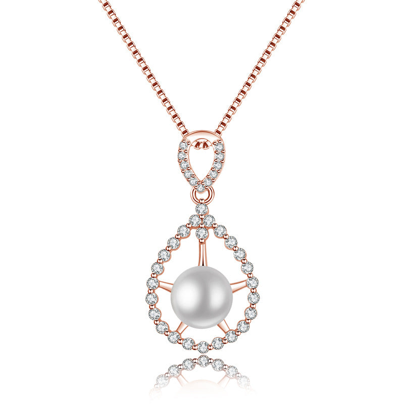 Damen Halskette mit luxuriösem Perlenanhänger und funkelnden Zirkonia-Elementen Shop Nory