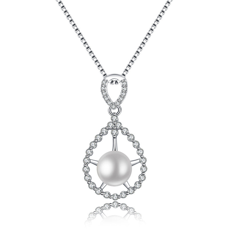Damen Halskette mit luxuriösem Perlenanhänger und funkelnden Zirkonia-Elementen Shop Nory