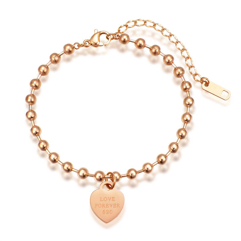 Damen Armband mit herzförmigem Anhänger und Kugeldesign Shop Nory