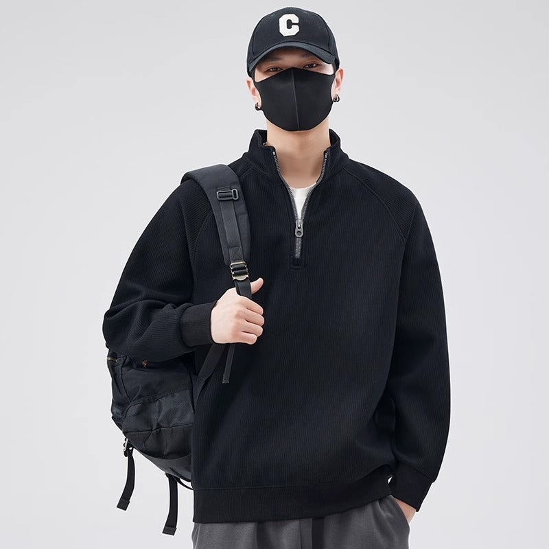 Lockerer Pullover mit Stehkragen und Reißverschluss