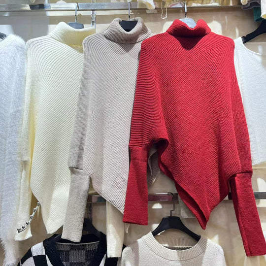 Damen-Rollkragenpullover mit unregelmäßigem Saum