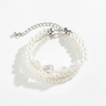 Damen Armband-Set mit Gliederdesign & Schlangenarmband in Goldoptik | Shop Nory