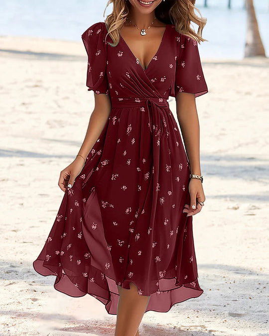 Elegantes Bedrucktes Kleid mit V-Ausschnitt und Krawatte